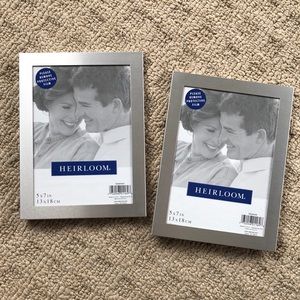 2 silver 5x7 picture frames (sold together)